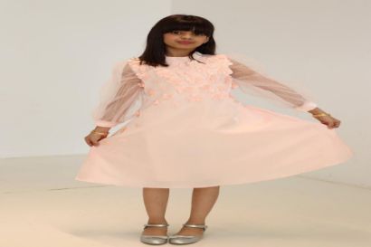 صورة فستان خربزي اكمام تل